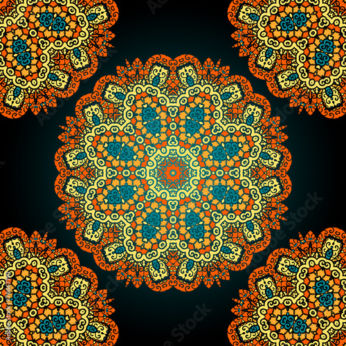 Seamless mandala over black background. Vitage vector wllpaper photo