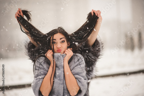 funny girls enjoying winter weather