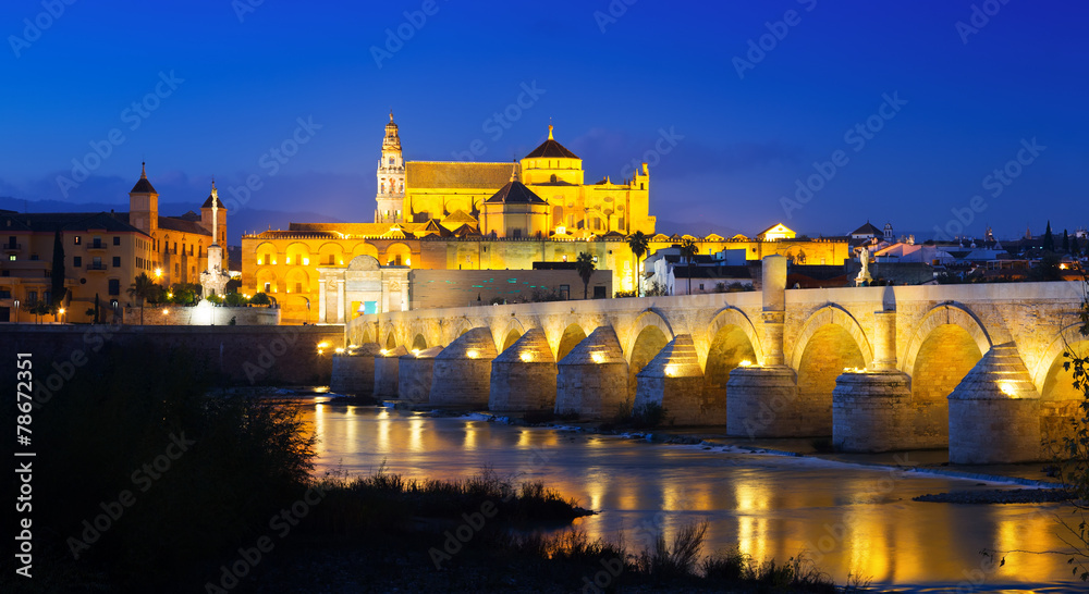 Bridge and  Mosque-cathedral of Cordoba in evening