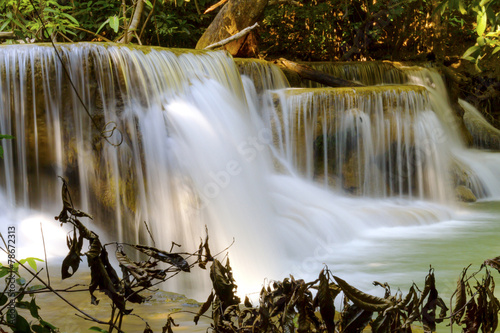 Waterfall and dry leaves