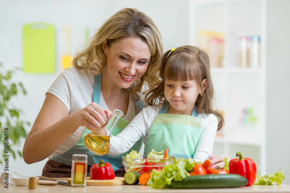 mom and kid preparing healthy food