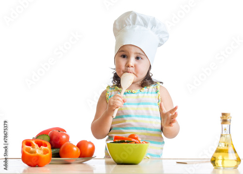 kid girl preparing healthy food