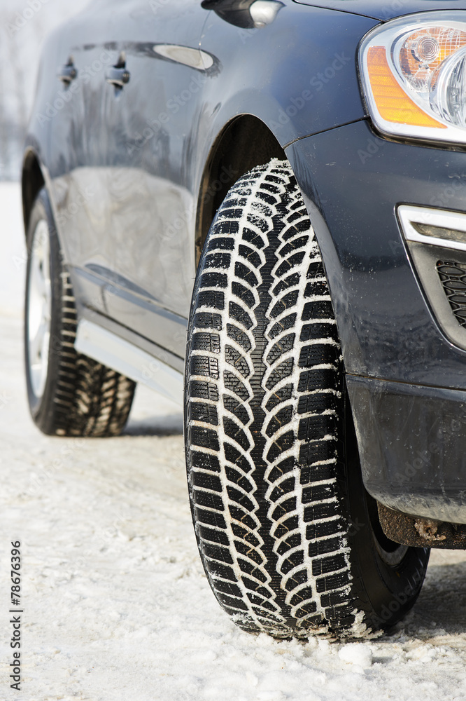 Winter tyres wheels installed on suv car outdoors