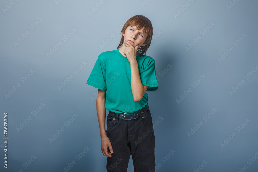 boy teenager European appearance in brown hair put his hand on c boy teenager European appearance in brown hair put his hand on c