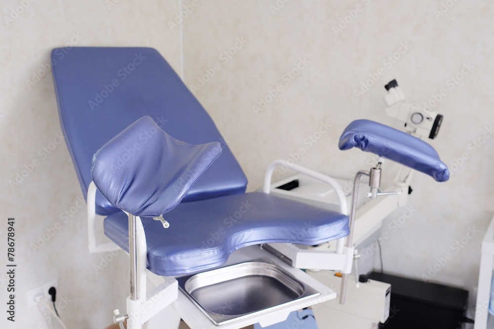 The image of blue gynecological chair