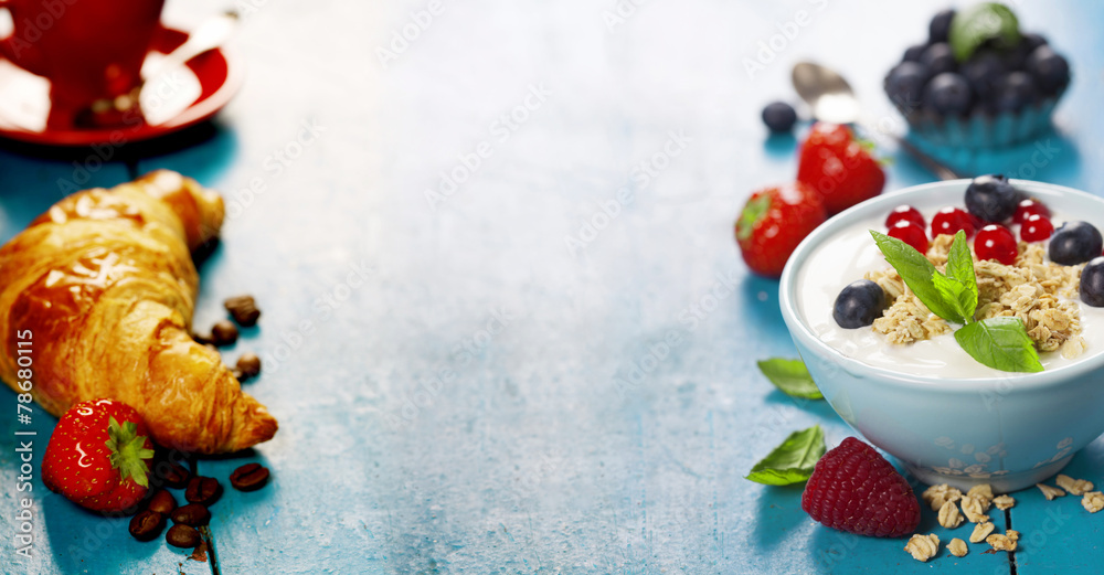 Healthy breakfast - yogurt with muesli and berries