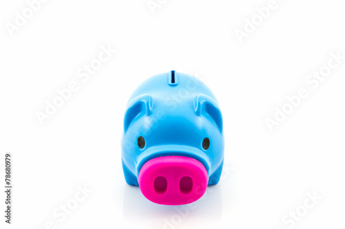 Blue piggy bank saving .