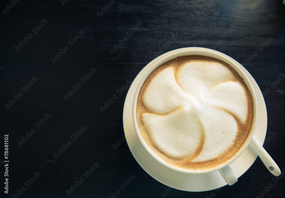 Cappuccino coffee cup with white spoon Cappuccino coffee cup with white spoon