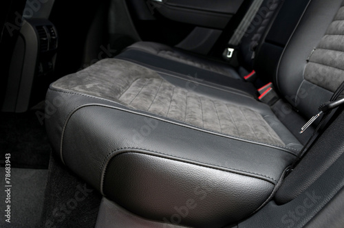 Back passenger seats in modern car. Interior detail. © alexdemeshko