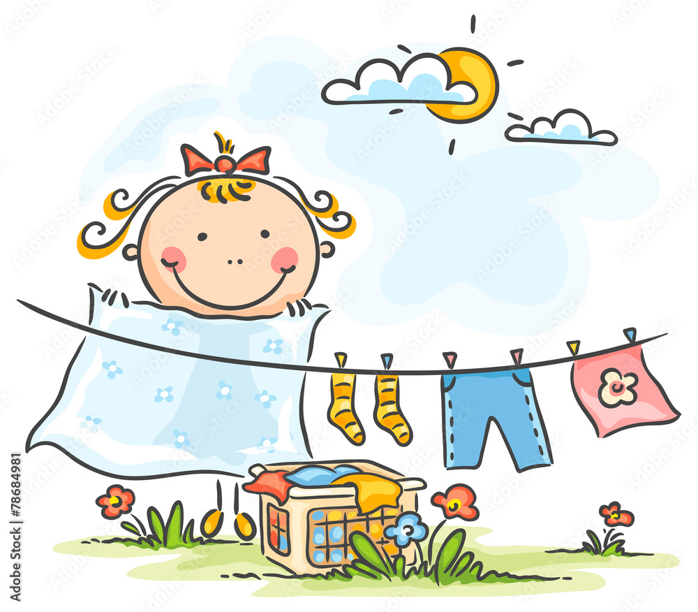 Fototapeta premium Little girl helping her mother with the laundry