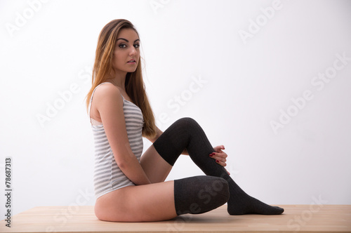 Portrait of a sexy young woman in bodysuit