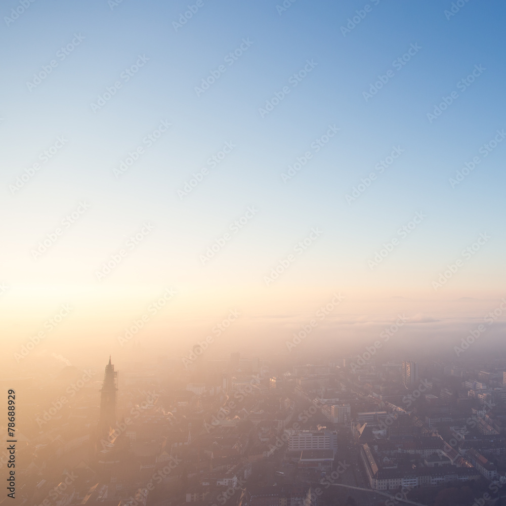 Fototapeta premium fog over Freiburg, Germany at sunset