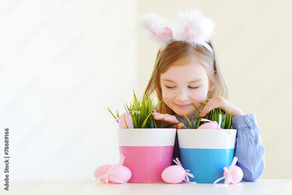 Adorable little girl wearing bunny ears on Easter Adorable little girl wearing bunny ears on Easter