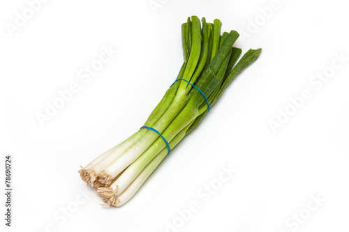 Spring onions isolated on a white background.