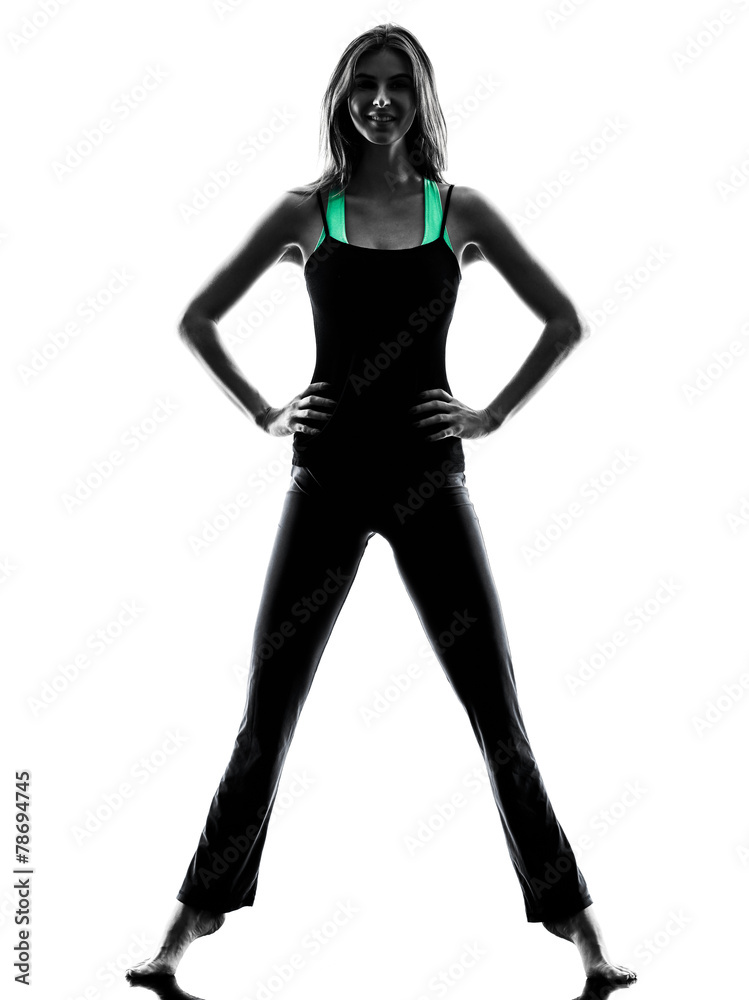 Fototapeta premium woman dancer stretching warming up exercises silhouette