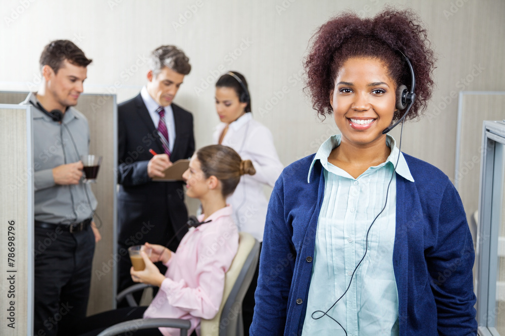 Happy Female Customer Service Representative Wearing Headphones Happy Female Customer Service Representative Wearing Headphones