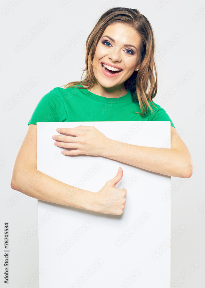 portrait of smiling woman holding white blank sign board. portrait of smiling woman holding white blank sign board.