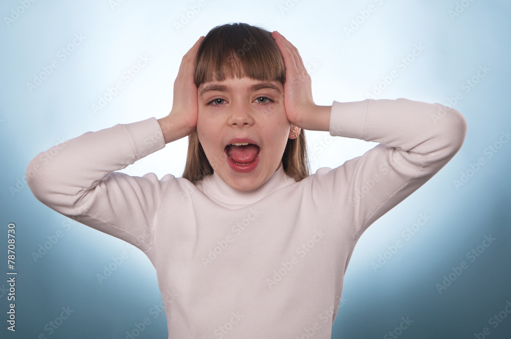 The expressive portrait of the young girl isolated The expressive portrait of the young girl isolated