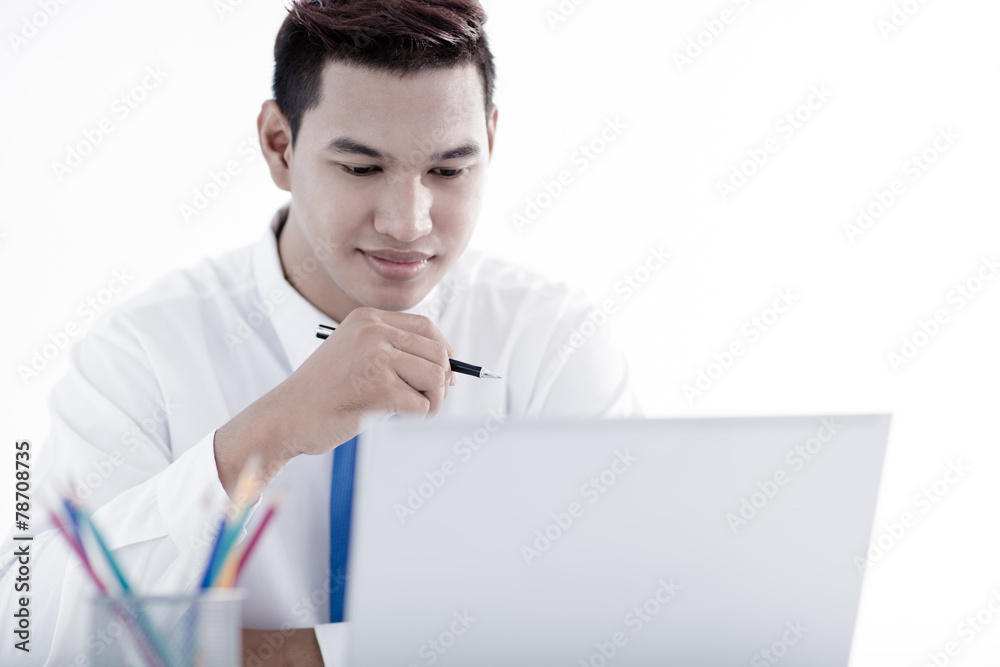 young asian businessman working in office young asian businessman working in office