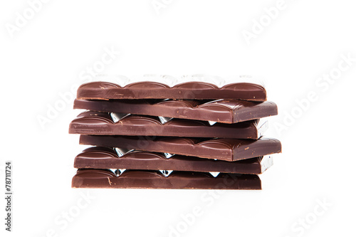 Chocolate bars stack isolated on white background.  Chocolate bl photo