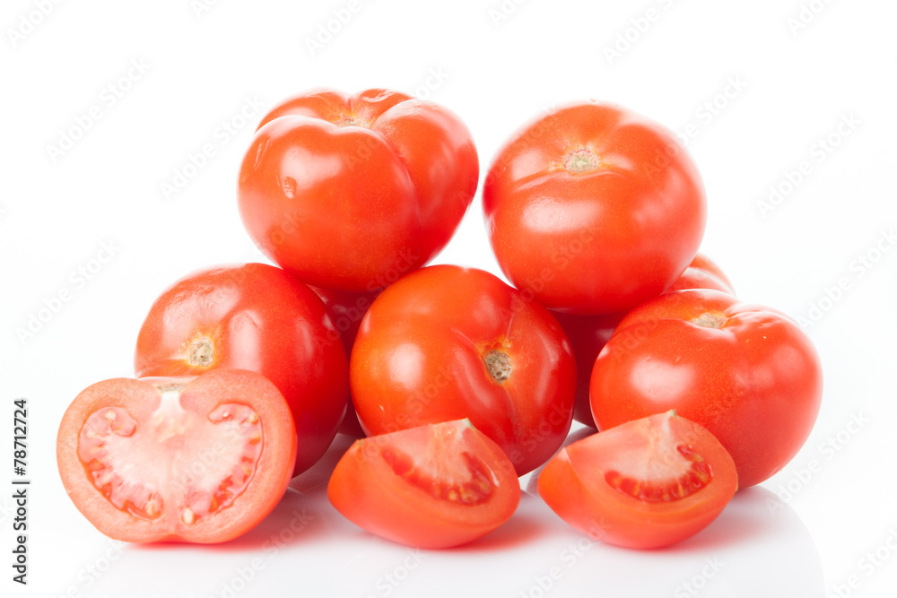 Fresh tomatoes isolated on white. Closeup of tomatoes Fresh tomatoes isolated on white. Closeup of tomatoes