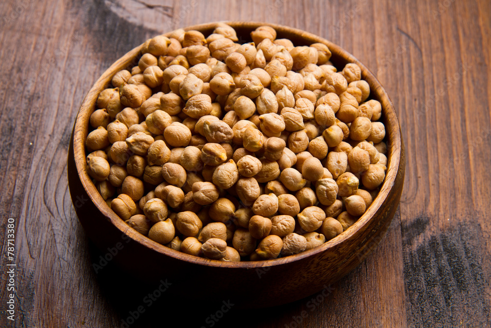 chickpeas on wood bowl