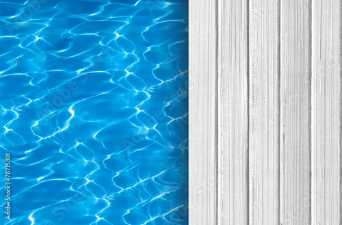 Swimming pool and wooden deck ideal for backgrounds © wolfelarry