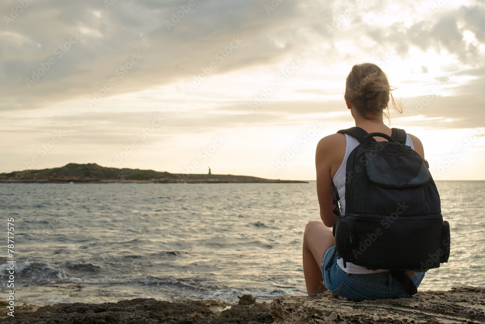 Woman with backpack on the sunset. Woman with backpack on the sunset.