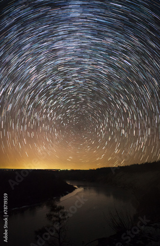 a beautiful night sky, Milky Way, star trails  and the trees