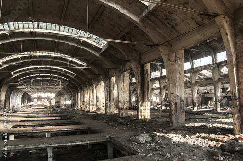 Old abandoned decayed grunge hall of vintage railway plant