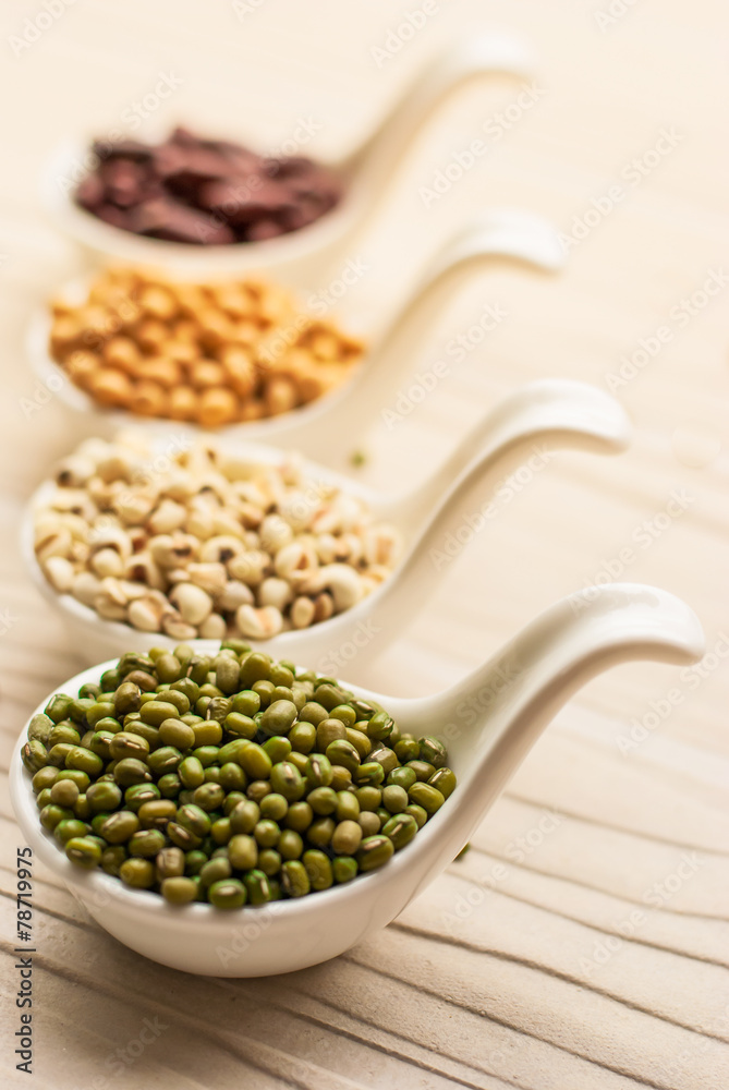 collection set of beans, legumes, peas, lentils on ceramic spoon collection set of beans, legumes, peas, lentils on ceramic spoon