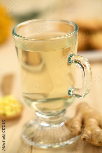 Freshly prepared hot ginger tea in glass