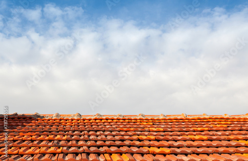 Empty photo background with red tile roof and sky