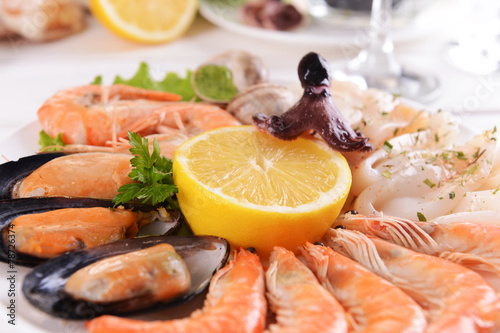 Tasty seafood on plate on table close-up