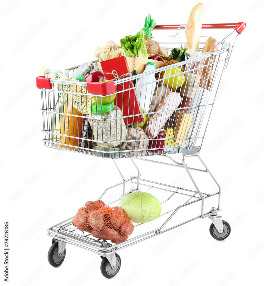 Shopping cart full with various groceries isolated on white Stock Photo