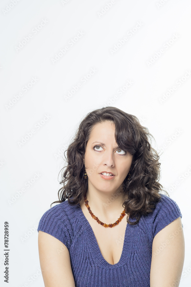 Young woman with pensative expression Young woman with pensative expression