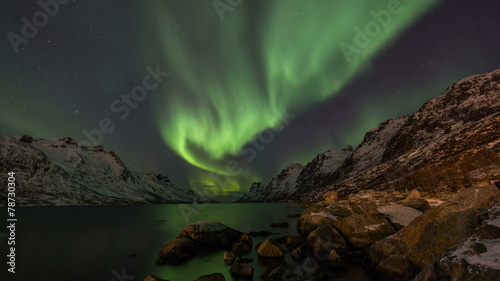 Northern Lights over fjords in Norway coast