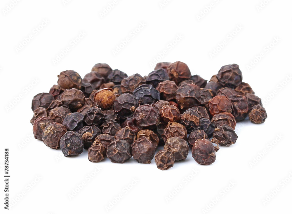 Obraz premium Black pepper was placed on a white background