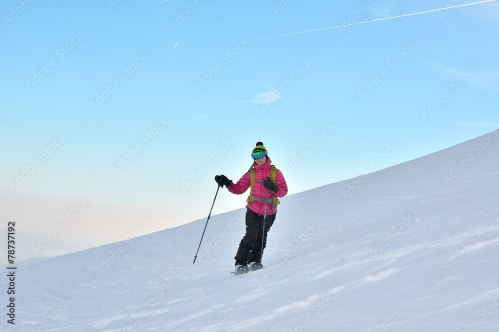 Woman skier in the soft snow