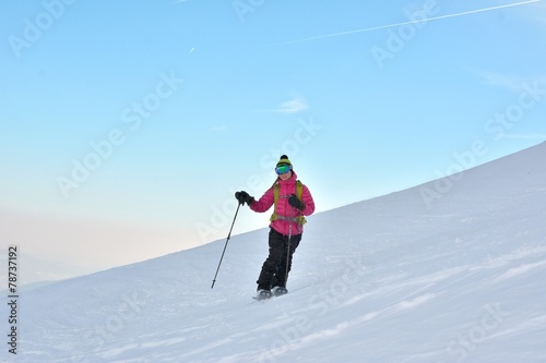 Woman skier in the soft snow