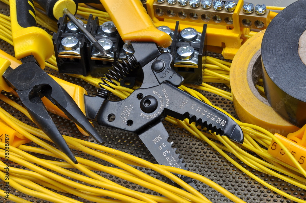 Pliers strippers with electrical component kit