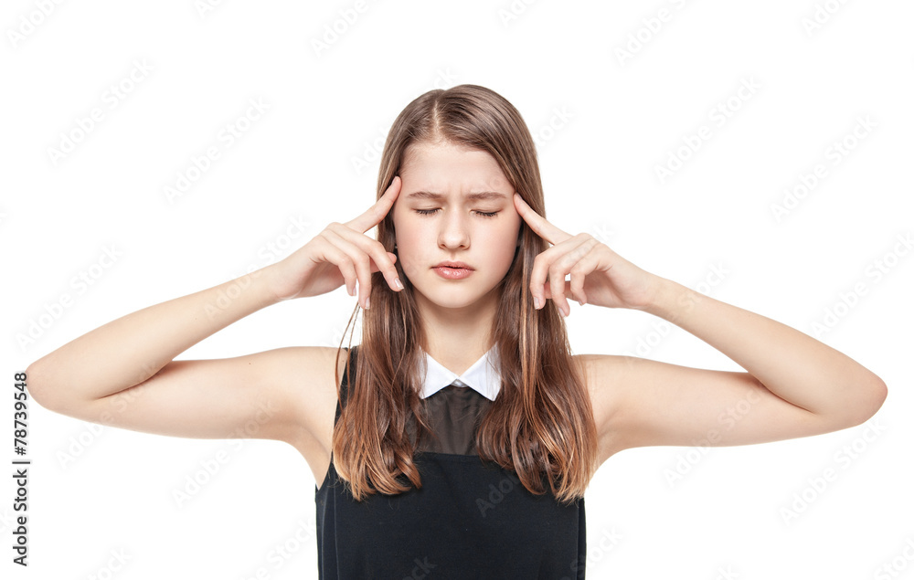 Young teenage girl pressed her fingers to the temple isolated Young teenage girl pressed her fingers to the temple isolated
