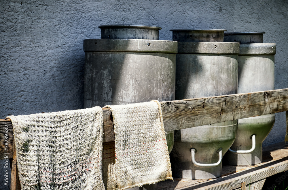 old milk canisters