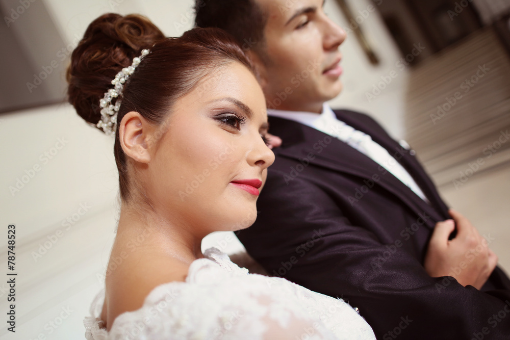 Portrait of a bride and groom posing