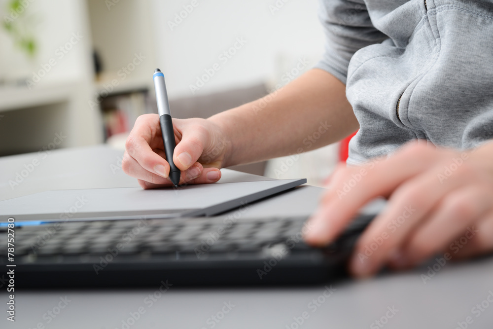 close up hands working with graphic tablet and keyboard close up hands working with graphic tablet and keyboard