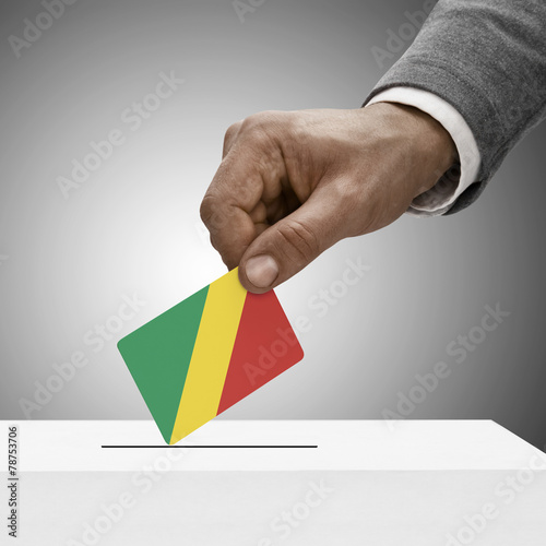 Black male holding flag. Voting concept - Congo-Brazzaville - Re