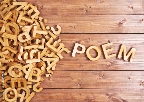 Word poem made with wooden letters