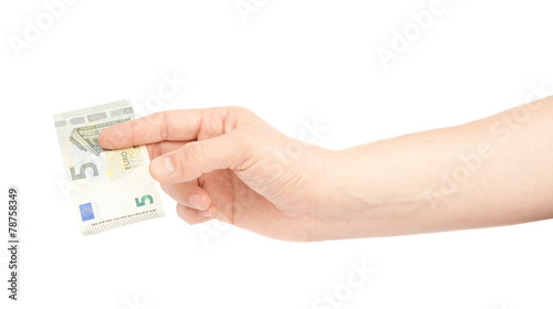 Hand holding five euro note isolated