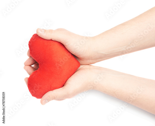 Carefully holding heart with two hands