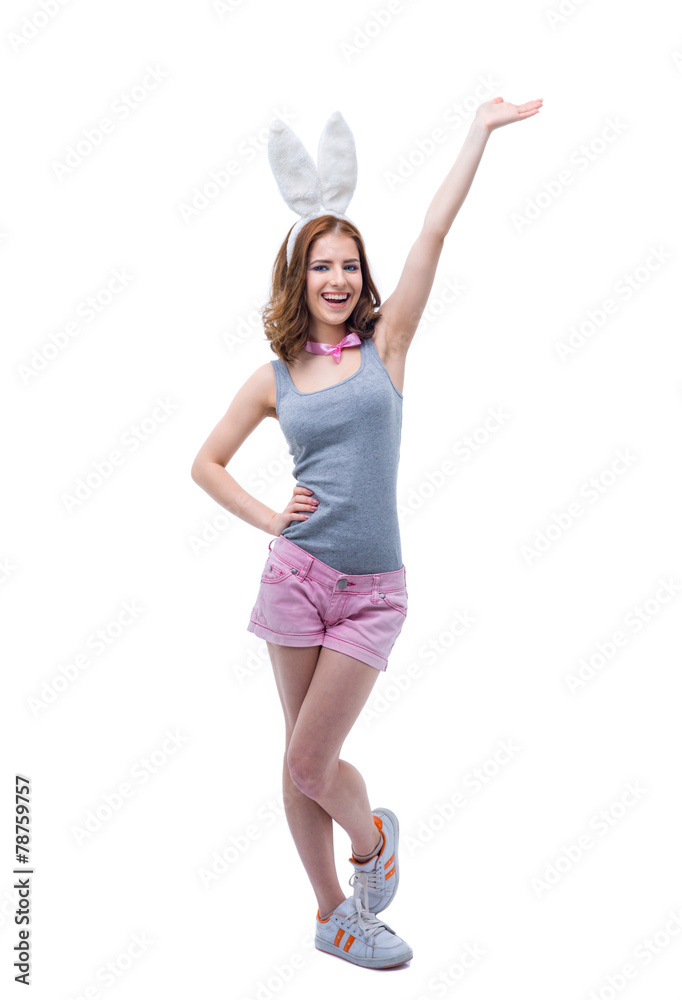 Full length portrait of a happy woman with raised hand up Full length portrait of a happy woman with raised hand up
